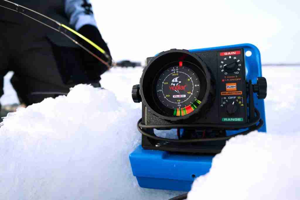 Transducer for ice fishing wedged in the snow